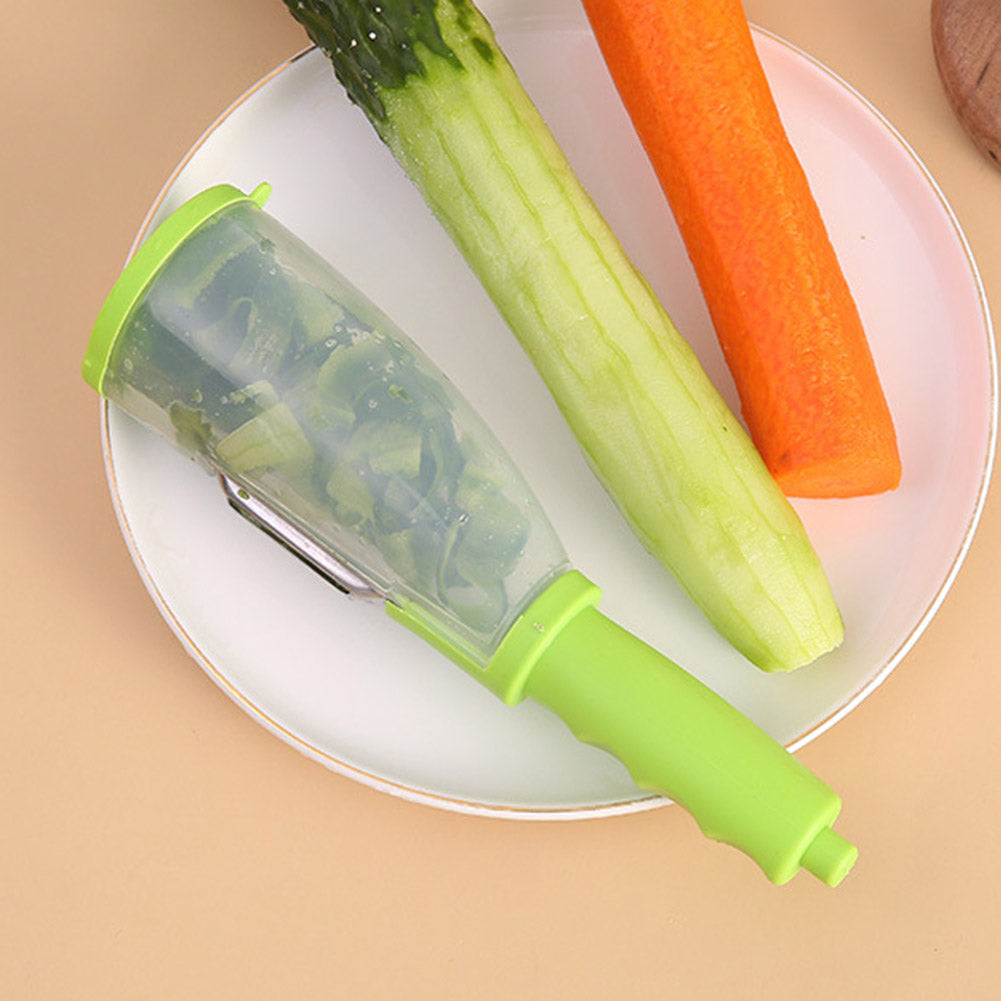 Kanevo Kitchen vegetable peeler with peeled cucumber and carrot